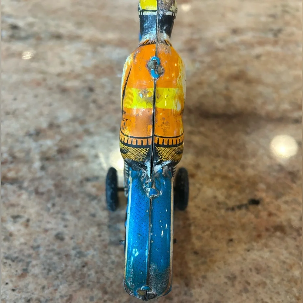Tin Lithograph Friction Drive Ballon Cordatic toy cycle EN-12-63 Vtg 1950 Era.